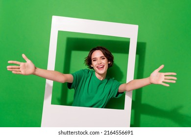 Photo of friendly kind person raise opened arms camera you invite isolated on green color background