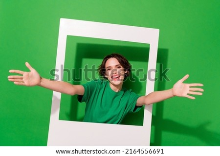 Photo of friendly kind person raise opened arms camera you invite isolated on green color background