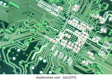 Am photo of the front side of green computer mother board.