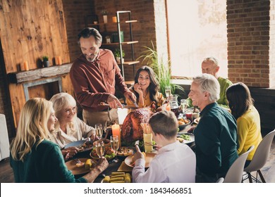 Photo Of Full Family Eight People Gathering Sit Two Little Kids Bristled Father Cut Fry Turkey Lovely Talking Funny Laugh Served Dinner Big Table Generation In Evening Living Room Indoors