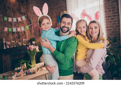 Photo Of Full Idyllic Family Parents Hands Hold Small Siblings Enjoy Festive Atmosphere House Indoors