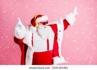 Photo funky crazy santa claus enjoy listen x-mas christmas newyear magic radio song headphones dance event wear sunglass suspenders headwear cap isolated pastel color background - Powered by Shutterstock