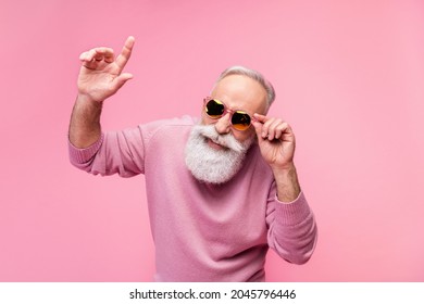 Photo Of Funky Grey Beard Hair Mature Man Dance Wear Eyewear Sweater Isolated On Pink Background