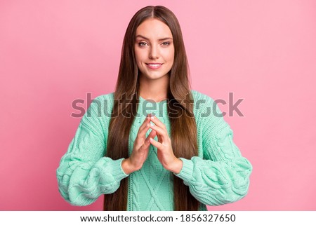 Photo of funky sly young person arms fingers together teal sweater outfit isolated on pink color background