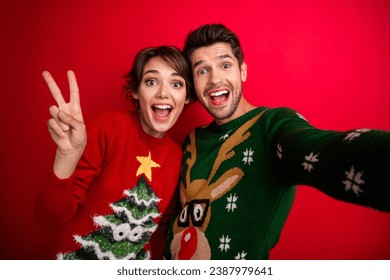 Photo of funny people lady guy celebrate new year make selfie video v sign isolated vivid color background - Powered by Shutterstock