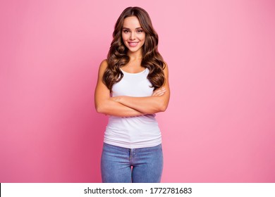 Photo of funny pretty wavy lady perfect groomed hairstyle arms crossed self-confident person business woman wear white casual tank-top jeans isolated pink color background - Powered by Shutterstock