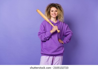 Photo of funny pretty woman wear sweatshirt playing baseball smiling isolated violet color background - Powered by Shutterstock