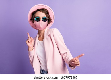 Photo Of Funny Pretty Young Woman Dancing Wear Medical Mask Coat Hat Glasses Isolated Purple Color Background