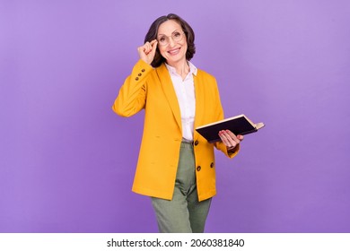Photo of funny teacher grey aged lady read book wear eyewear yellow jacket isolated on purple color background