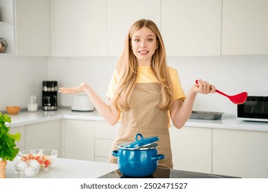 Photo of funny worried cute girl cooking soup food meal house white kitchen indoors - Powered by Shutterstock