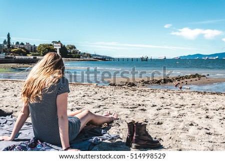 Photo of Girl at Kitsilano Beach in Vancouver, Canada