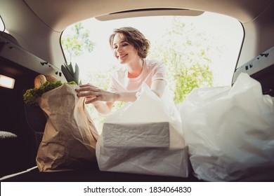 Photo Of Girl Shopper Put Shopping Bags In Car Trunk Cabin Ready Ride Drive Home Cook Family Husband Meal In Town Center Outside