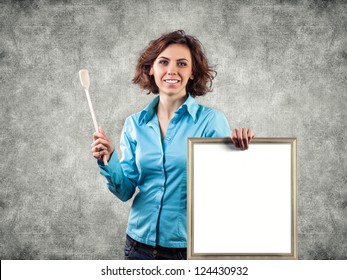 Photo of the girl with a spoon and menu - Powered by Shutterstock