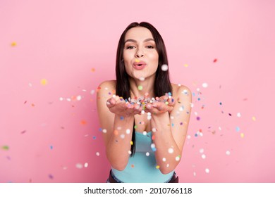 Photo Of Girlish Millennial Party Lady Blow Confetti Wear Blue Top Isolated On Pink Color Background