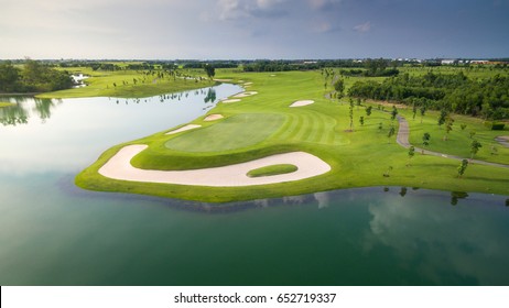 Photo of a Golf Green Flag and Hole from top by drone