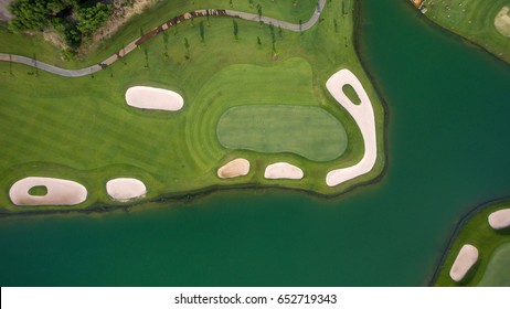 Photo Of A Golf Green Flag And Hole From Top By Drone