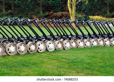 Photo of golf trolleys in a line