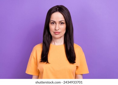 Photo of good mood confident woman with straight hairstyle dressed orange t-shirt look at camera isolated on purple color background - Powered by Shutterstock