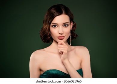 Photo of good mood stunning feminine young girl thinking brainstorming wear sexy dress isolated on green color background