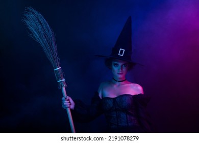 Photo of gorgeous lady magician frightening medieval people hold broomstick isolated on ultra violet color background - Powered by Shutterstock