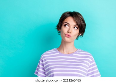 Photo of gorgeous nice pretty lovely woman with bob hairstyle dressed striped t-shirt look empty space isolated on teal color background - Shutterstock ID 2211265485