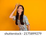 Photo of gorgeous stunning young female look blank space become prom queen isolated on yellow color background