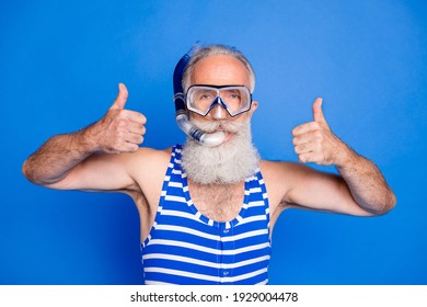 Photo Of Grey Haired Elderly Man Make Thumbs Up Wear Mask Diver Wear Swimsuit Isolated On Blue Color Background