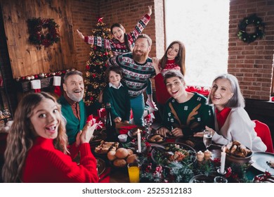 Photo of group family members sit festive table have fun gather celebrate christmas apartment indoors - Powered by Shutterstock