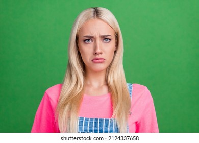 Photo Of Grumpy Upset Displeased Cute Lady Frown Look Camera Wear Striped Overall Isolated Green Color Background