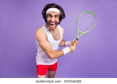 Photo of guy hold racket open mouth crazy face wear headband sportswear spectacles isolated violet background
