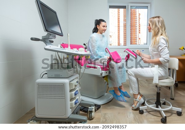 Photo\
of a gynecologist doctor and a patient on a gynecological chair.\
Preventive reception, preparation for medical examination,\
pregnancy management, health care gynecology\
contol