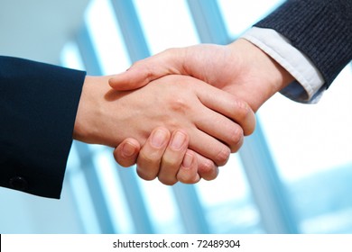 Photo Of Handshake Of Business Partners After Striking Deal