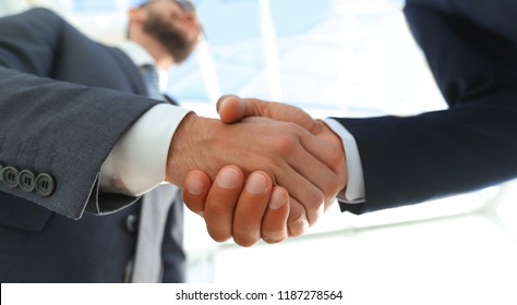 Photo Of Handshake Of Two Happy Businessmen