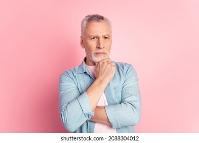 Photo of handsome aged man focused arm touch chin minded think calm ponder isolated over pink color background - Powered by Shutterstock