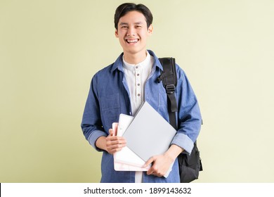 A Photo Of A Handsome Asian Student With A Confident Look
