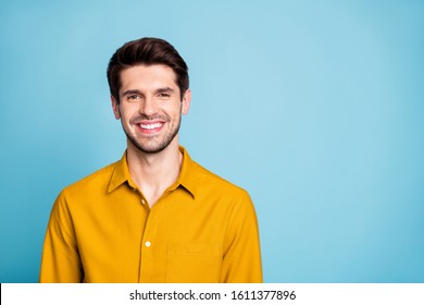 Photo Of Handsome Creative Executive Director Wearing Yellow Shirt Smiling Toothily Isolated Over Blue Pastel Color Background