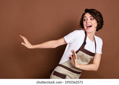 Photo of happy beautiful funky funny smiling woman barista dancing look copyspace isolated on brown color background - Shutterstock ID 1955562571
