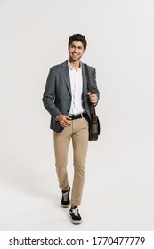 Photo Of Happy Caucasian Businessman Smiling While Walking With Bag Isolated Over White Wall