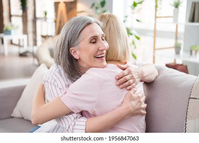 Photo Of Happy Charming Cheerful Young Woman And Old Lady Hug Love Family Indoors Inside House Home