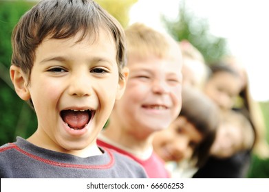 Photo of happy girls with handsome lads in front smiling at camera - Powered by Shutterstock