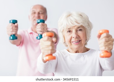 Photo Of Happy Sporty Elderly Woman At Gym