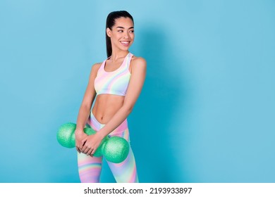 Photo Of Healthy Aerobics Coach Hold Massage Roll Look Empty Space Wear Rainbow Print Suit Isolated Blue Color Background