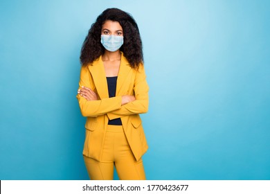 Photo Of Her She Attractive Chic Classy Luxury Lady Folded Arms Wearing Safety Mask Mers Cov Infection Influenza Preventive Measures Unemployed Jobless Isolated Blue Color Background