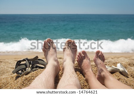 a photo of honeymooners on the beach
