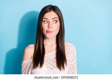 Photo of hungry excited young woman look empty space imagine yummy food isolated on blue color background - Shutterstock ID 1993438271