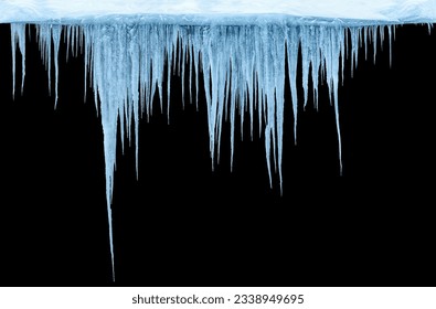 Photo icicles group on an black background, isolated object.