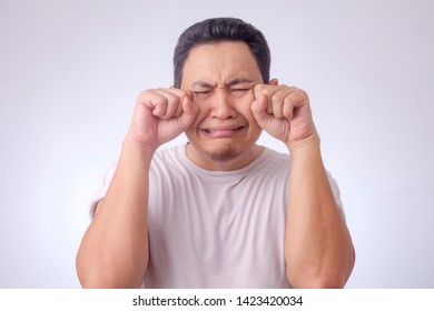 Photo Image Of Funny Asian Man Crying Hard, Sad Depression Frustration Hopeless Expression