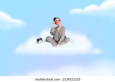 Photo image of young charming lady sitting on fluffy comfortable cloud in sky see lovely dream look up wait awakening saturday morning