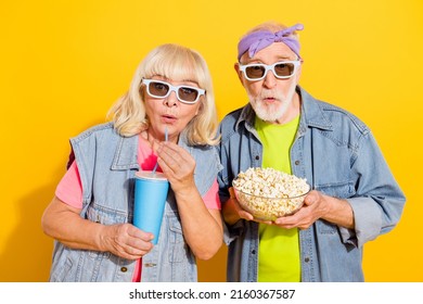 Photo Of Impressed Funky Girlfriend Boyfriend Dressed Denim Outfit Watching Action Movie Isolated Yellow Color Background