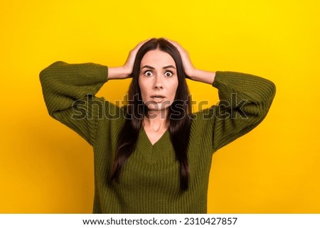 Photo of impressed lady arms touch head staring speechless isolated on yellow color background